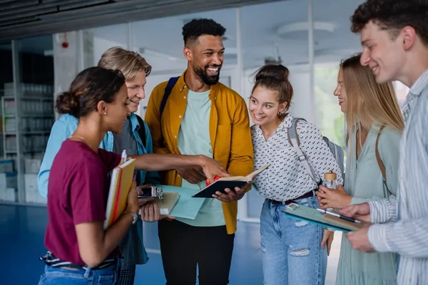 group-of-university-students-standing-in-corridor-2022-01-18-23-33-46-utc (1)